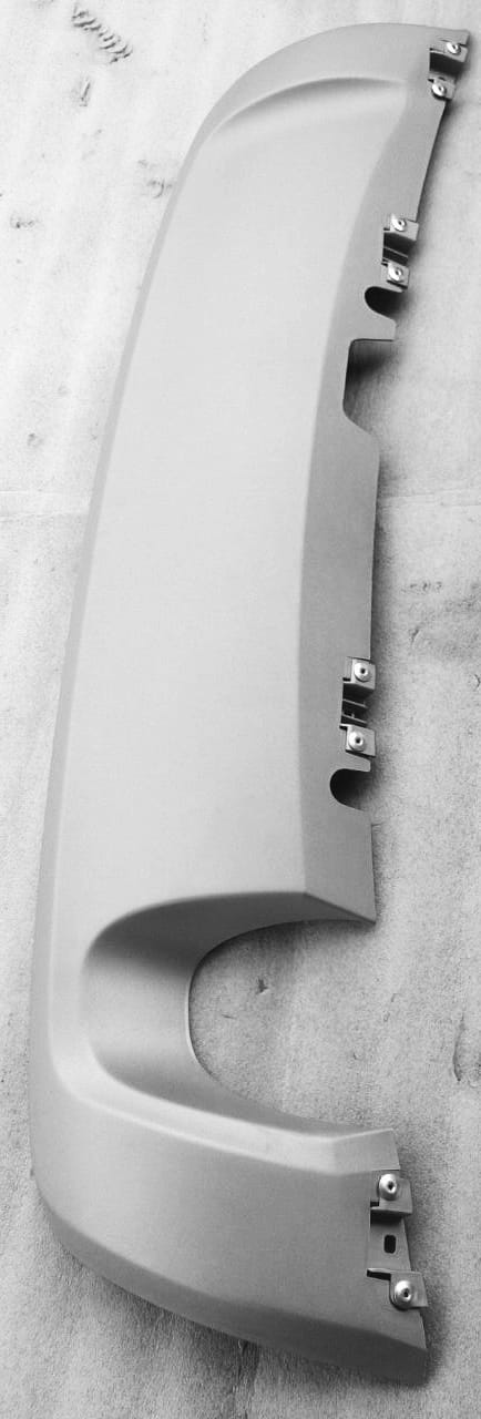 Nissan Terrano rear bumper moulding, part number 850704579R, showing the black plastic bumper strip on the vehicle's rear.