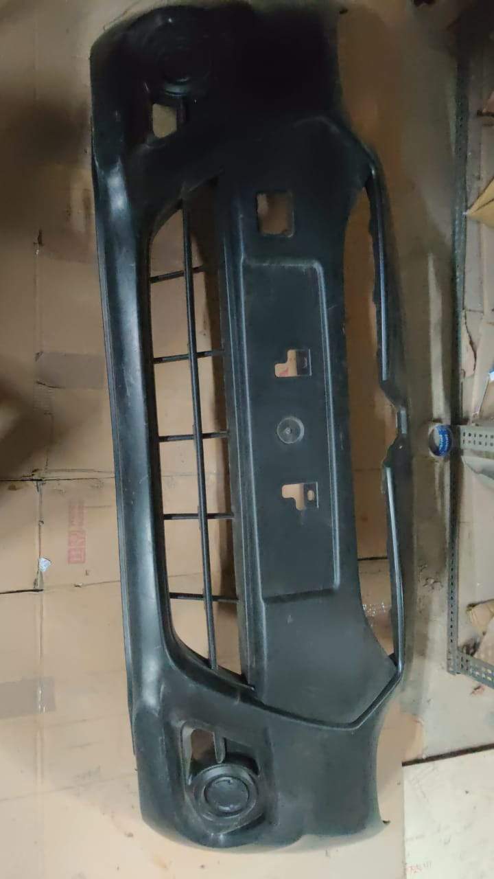 Nissan Qashqai front bumper face with Nissan logo, part number 620223BH0H, showing the bumper's design and fitment details