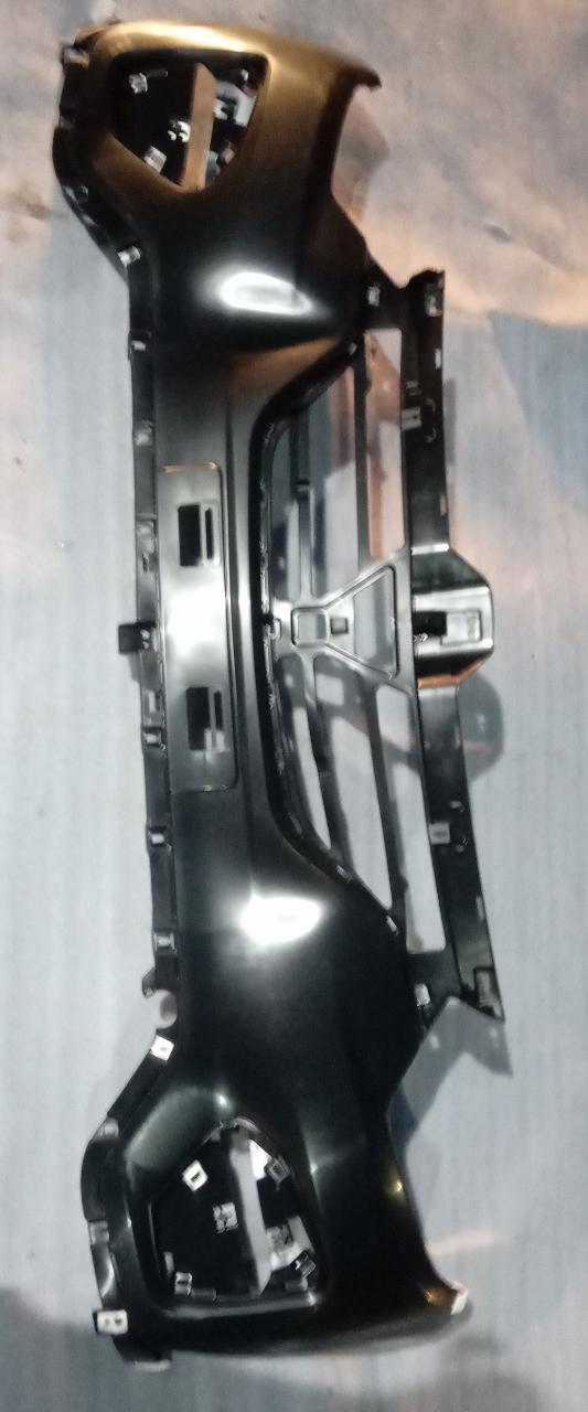 Nissan bumper moulding upper replacement part showing a close-up of the Nissan bumper moulding for vehicle repair.