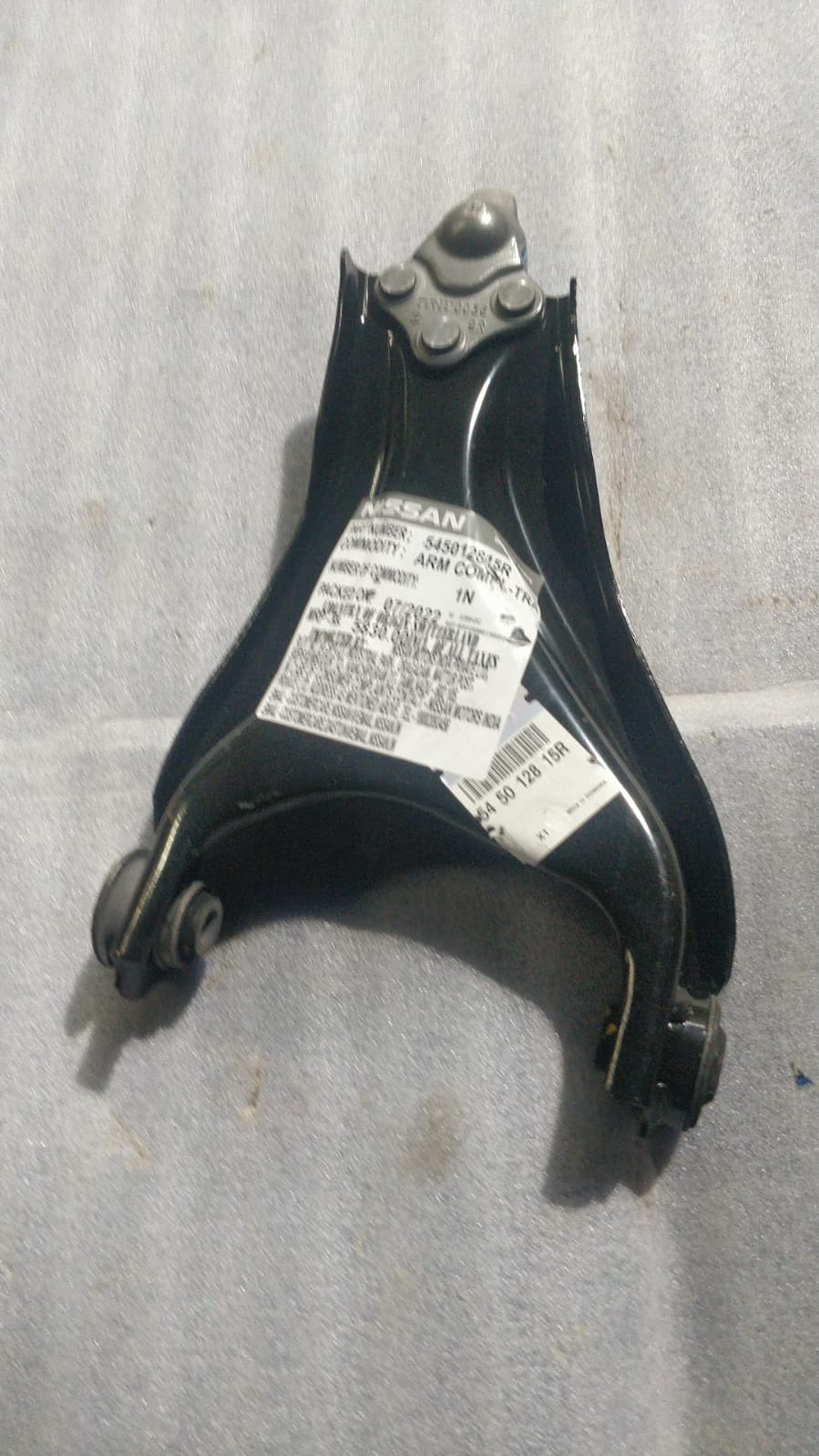 Renault Terrano rear trunk control arm part #545012815R, automotive suspension component showing the arm and mounting points.