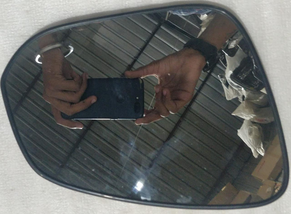 Right-side mirror glass for Toyota Innova Crysta Type 3, model number 879310KC10, showing the reflective surface and mirror frame.