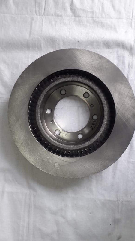 Toyota disc brake rotor for Toyota vehicles, model #435120K260, showing a close-up of the brake disc with detailed surface texture.