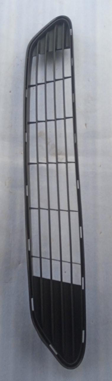 Toyota Yaris radiator grille lower replacement part, black plastic with Toyota branding, for Vios/Yaris models.